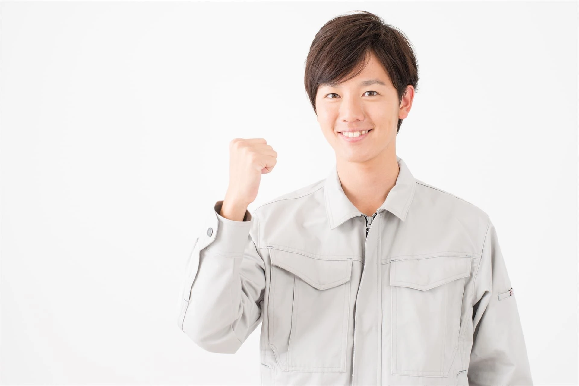 ポーズを決める作業服の男性